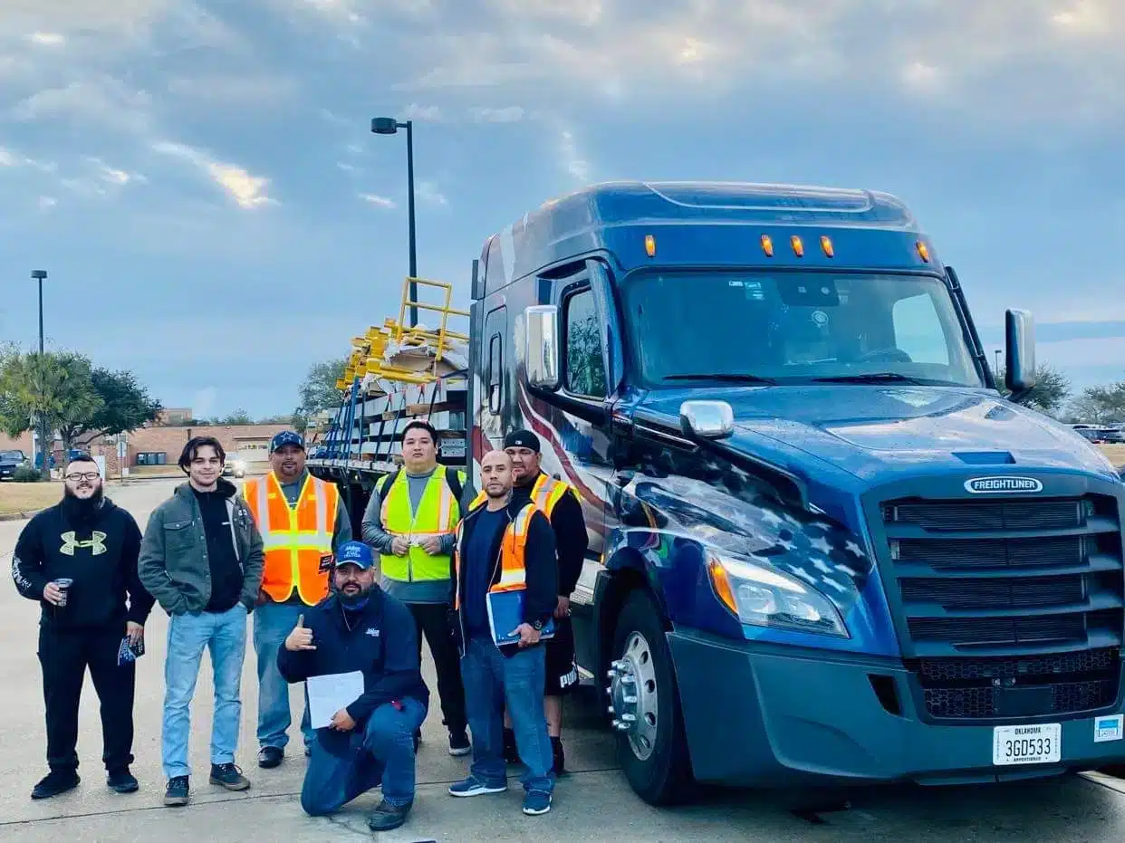 Photo of a Melton Road Dawg posing with CDL students